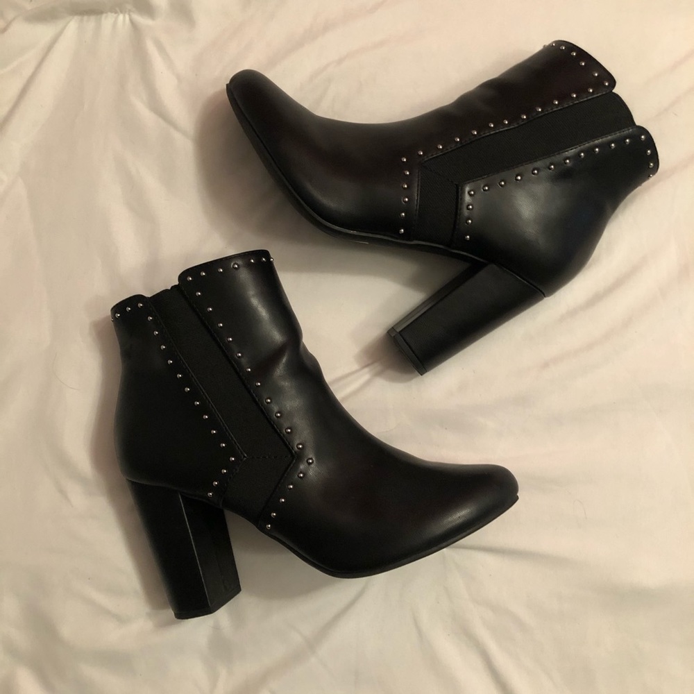 Black boots with silver studs.